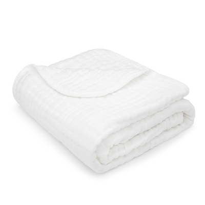 Soft and breathable white muslin cotton blanket for babies with delicate woven pattern