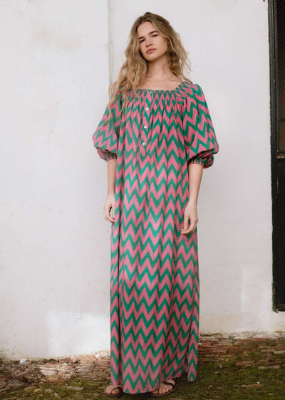 Simona Dress Zig Zag: A beautiful knee-length dress with a striking zig zag pattern