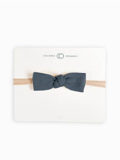 Organic Baby Dainty Bow Headband - Harbor: a soft, stretchy headband with a delicate, organic bow in a beautiful harbor blue color, perfect for your little one's comfort and style