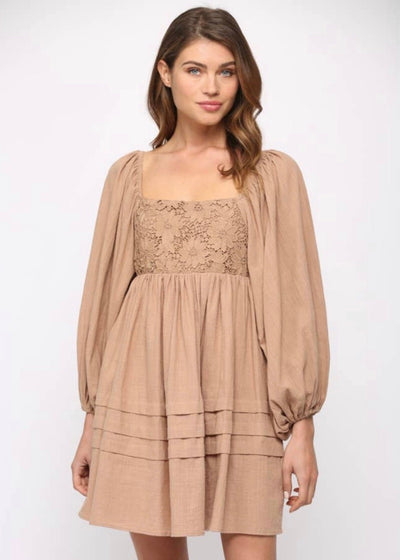 Light brown lace puff sleeve dress with intricate detailing and elegant design