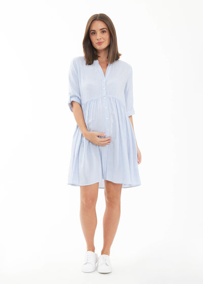 Sam Stripe Dress Sky Blue, a beautiful knee-length dress with sky blue and white stripes, perfect for a casual day out in the sun