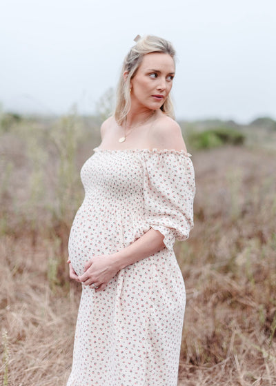 Beige floral muslin dress with ruffle sleeves and a V-neckline