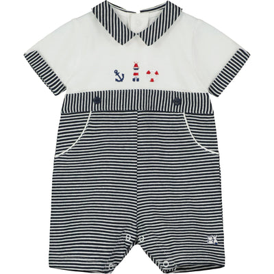 Navy blue nautical boys romper with white anchor print and matching hat