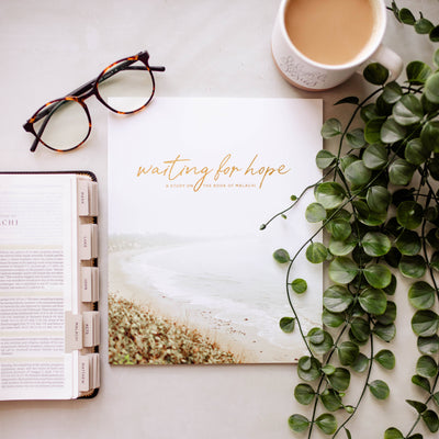 Cover of the bible study book Waiting for Hope | Malachi Study featuring a woman looking out into the distance with a hopeful expression