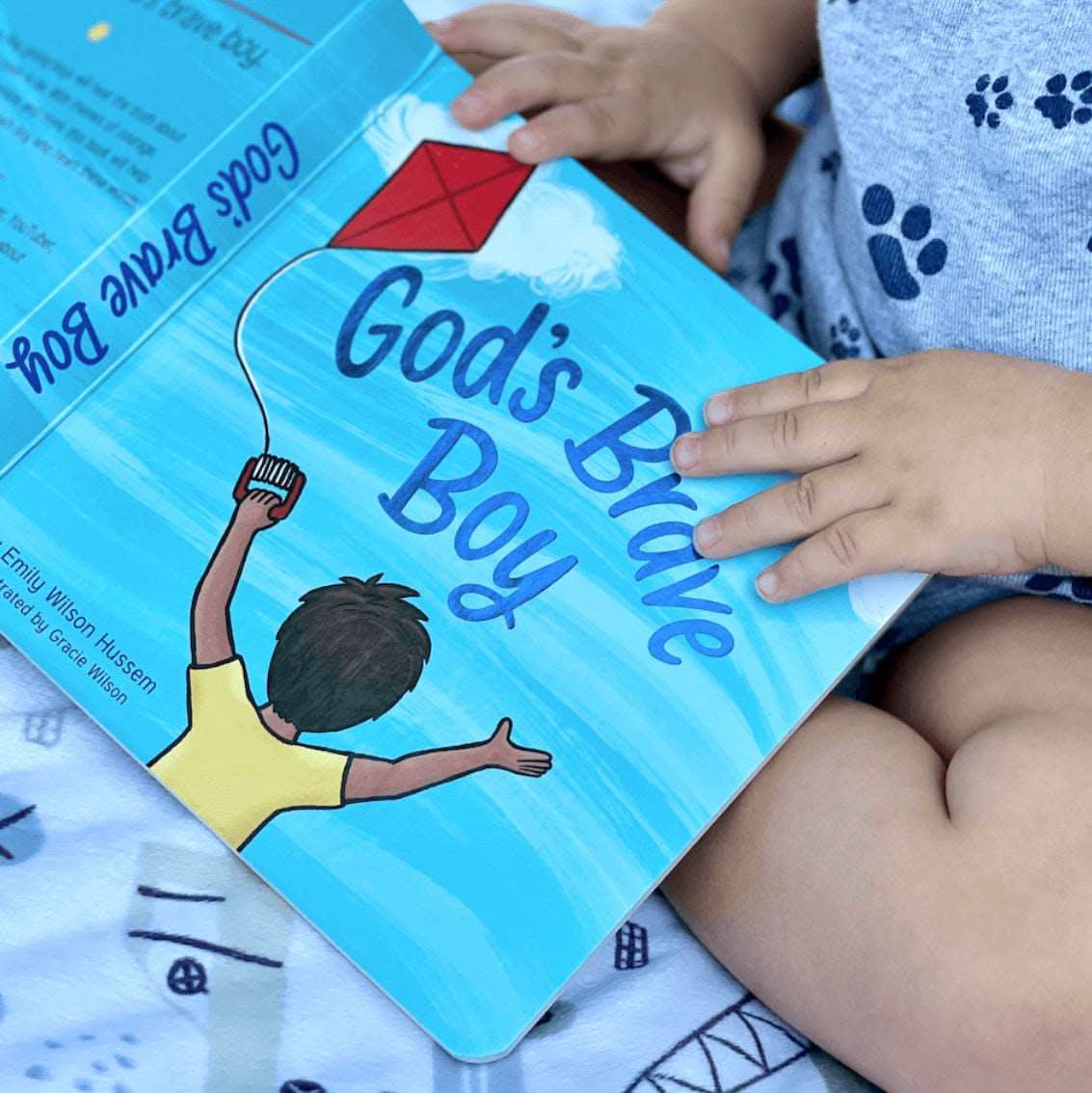 Children's board book featuring diverse boys, colorful illustrations, and Scripture-based text.