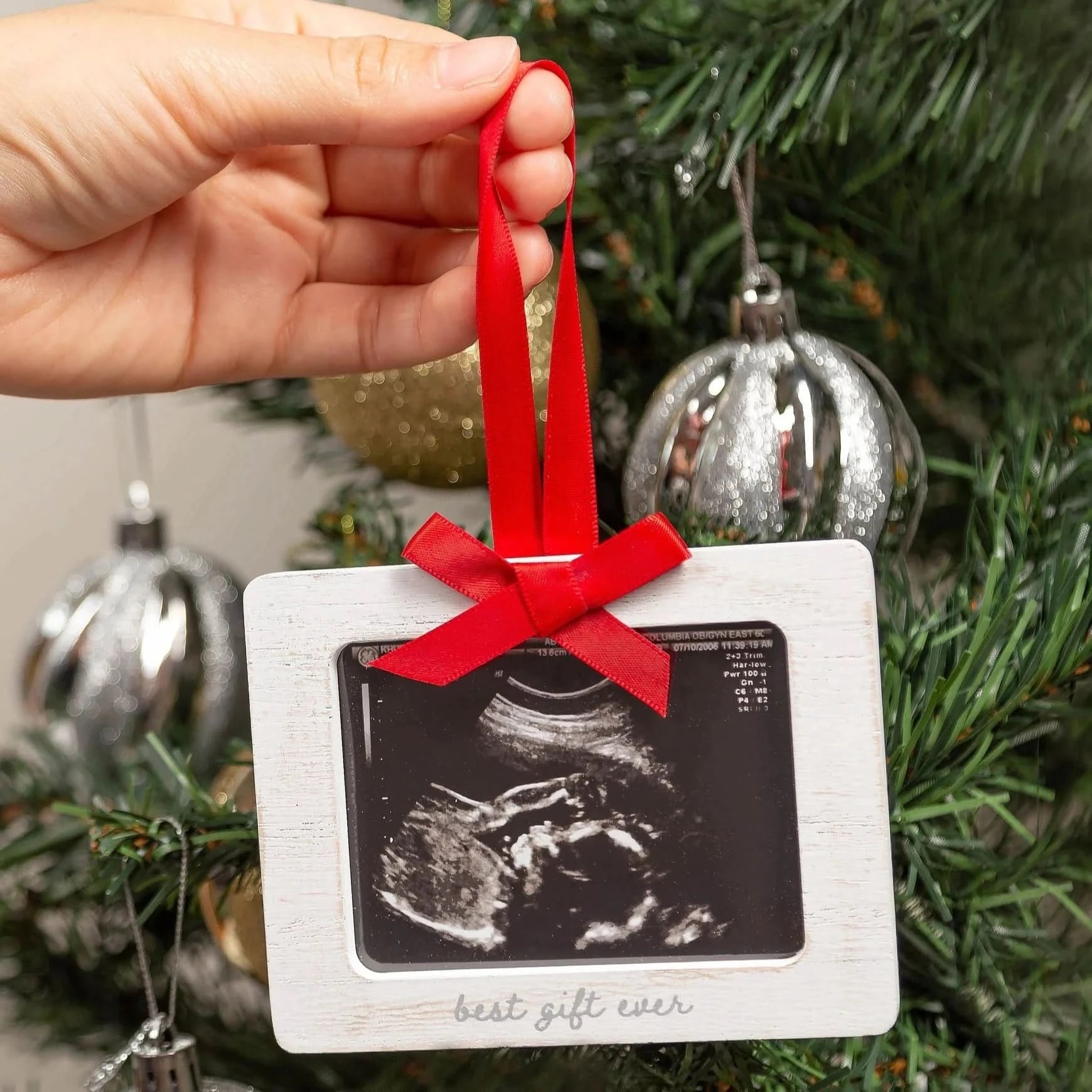 Wooden holiday ornament with "best gift ever" text and burlap ribbon for hanging, photo insert included