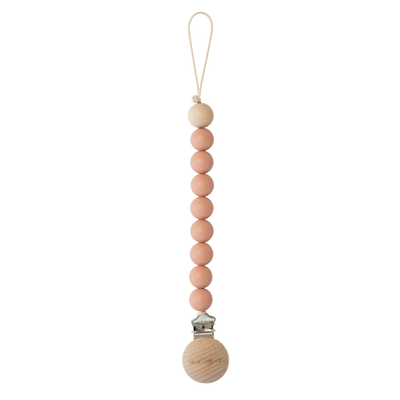 Pacifier clip with peach-colored beads and white ribbon 