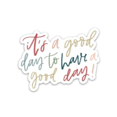 Colorful round fridge magnet with a quote 'Good day for a good day'