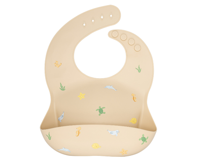 Silicone bib with Hawaiian sea animals design on a blue background