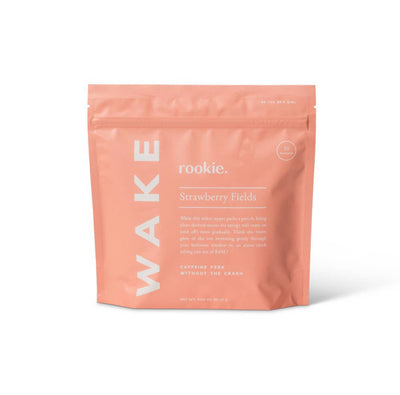 Two Wake Stick Packs, one in blue and one in pink, with vibrant packaging and natural ingredients for a refreshing wake-up experience