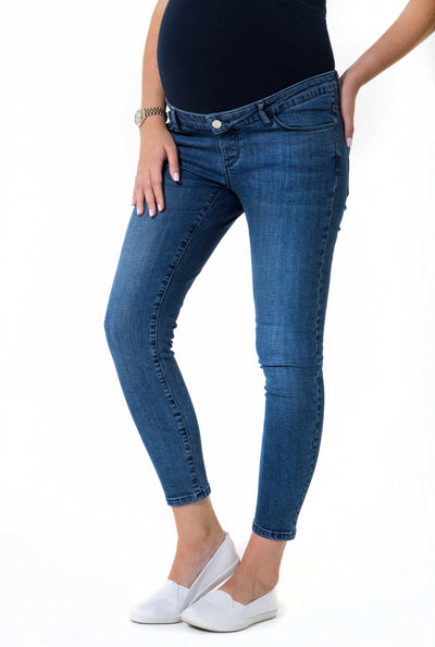 Close-up of Classic Blue Maternity Skinny Jeans, side view, stylish design